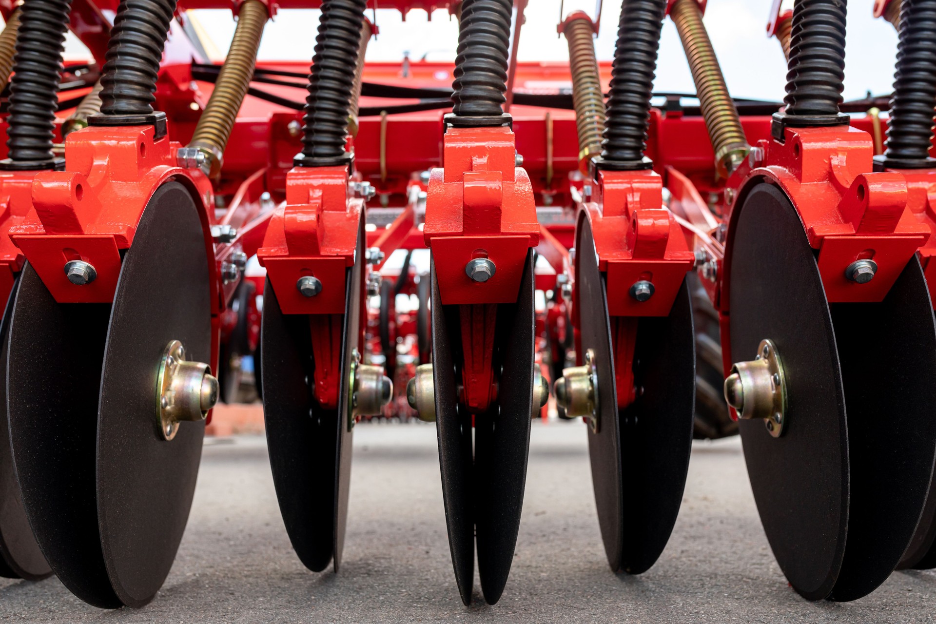 Precision seeder discs close-up for industrial design. Modern Modified Agricultural Seeder.